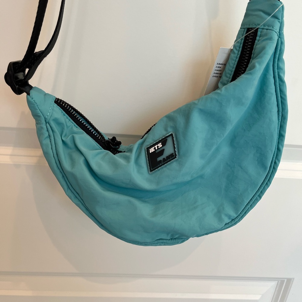 Lets Frans Teal Crossbody Bag from Urban Outfitters
